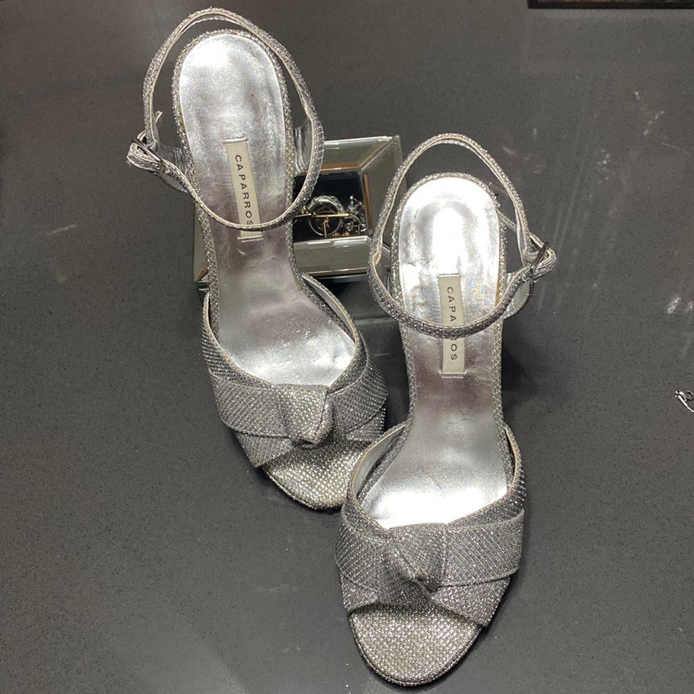 Caparros silver heels in size 7.5